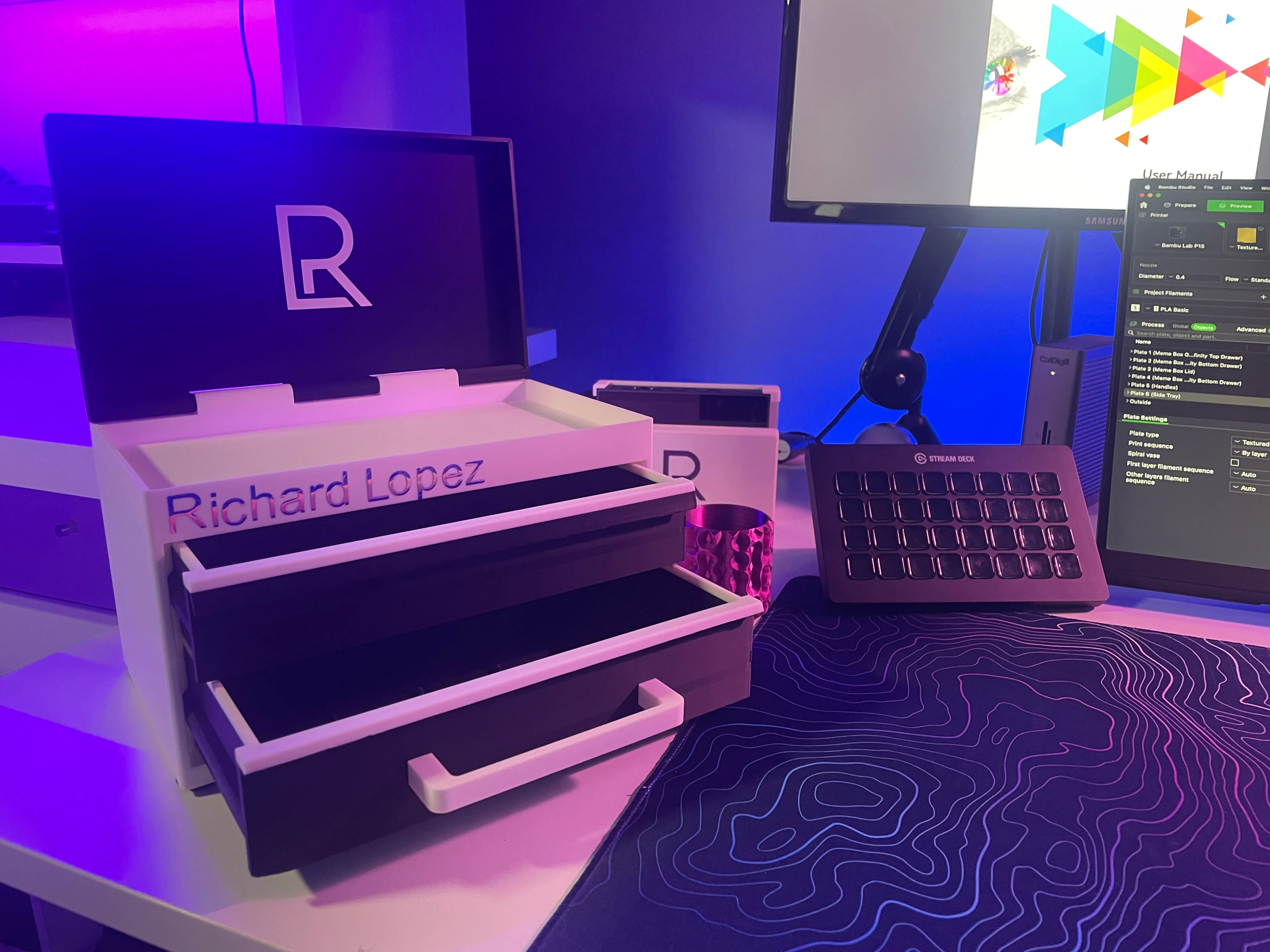 3D-printed workshop drawer system with custom-embossed branding, print-bed in background